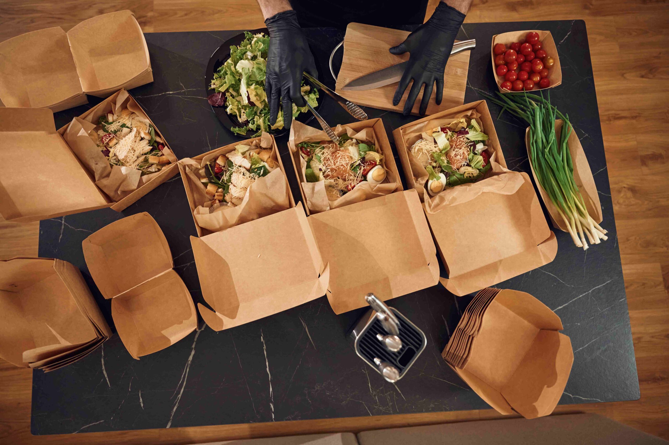 burgers-and-vegetables-man-is-packing-food-into-t-2025-03-18-20-38-36-utc_11zon